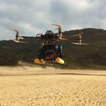 Revolver uses helicopter drone to film surfing Santas in Queensland for Aldi